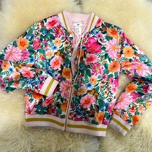 Used. Girls think jacket. Perfect for windy  spring and summer. Used few times.
